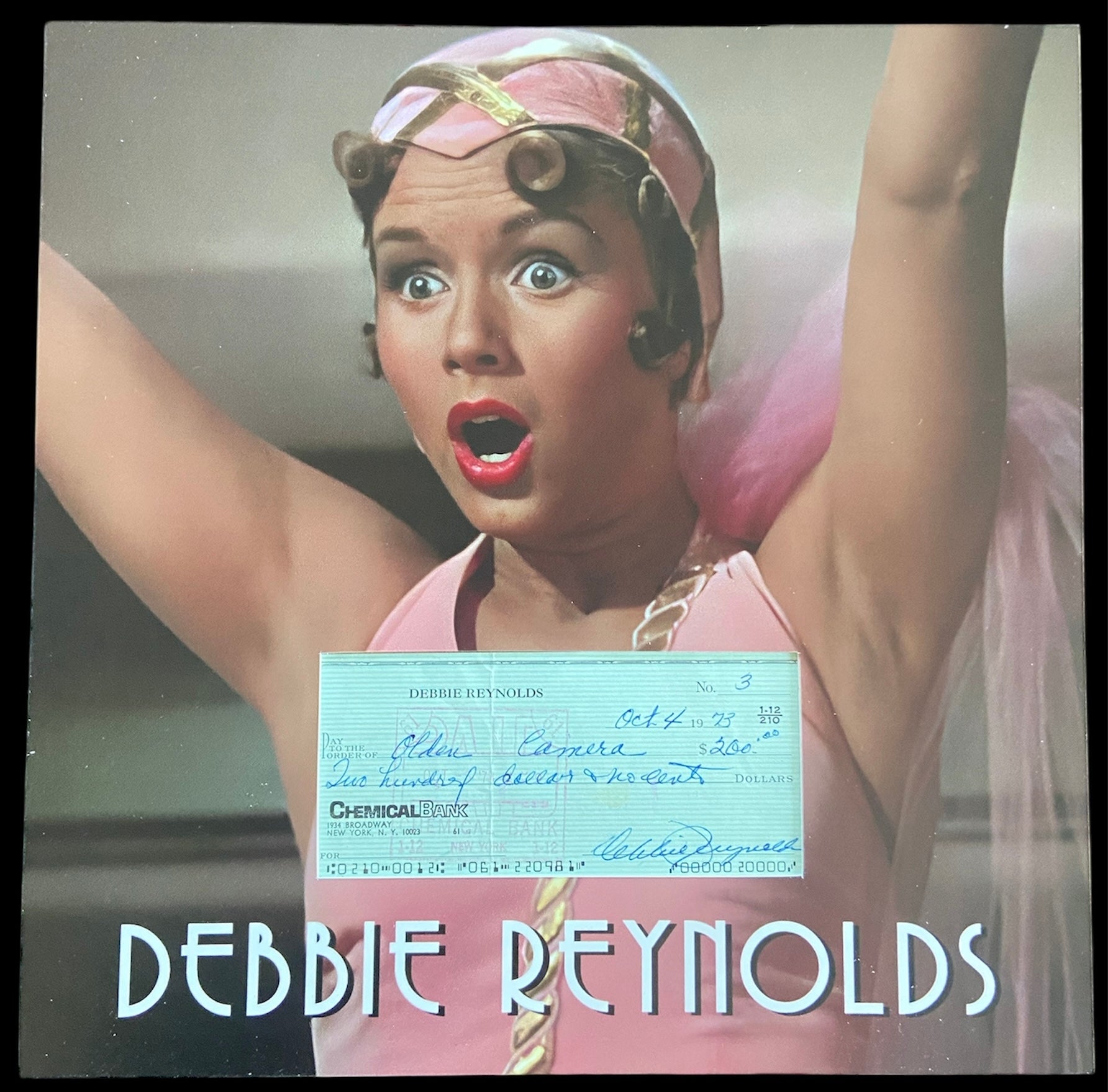 Debbie Reynolds Signed Check with Matted Frame (1973 check to "Older Camera")